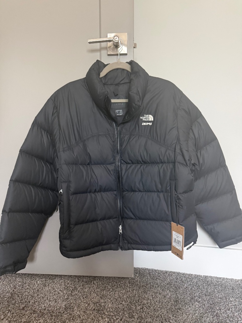 Skims North Face puff jacket